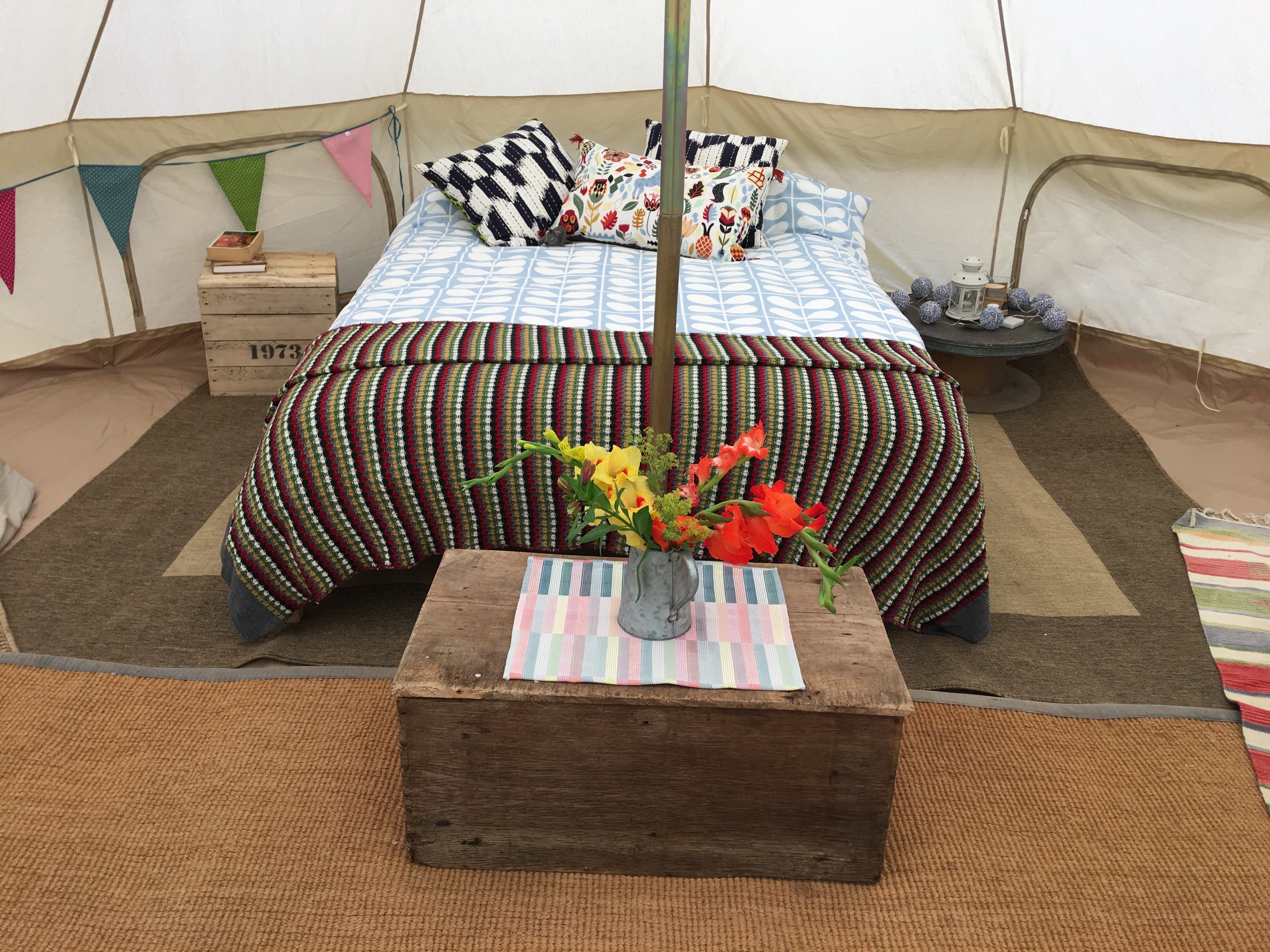 Bell tent interior at Harry's Campsites